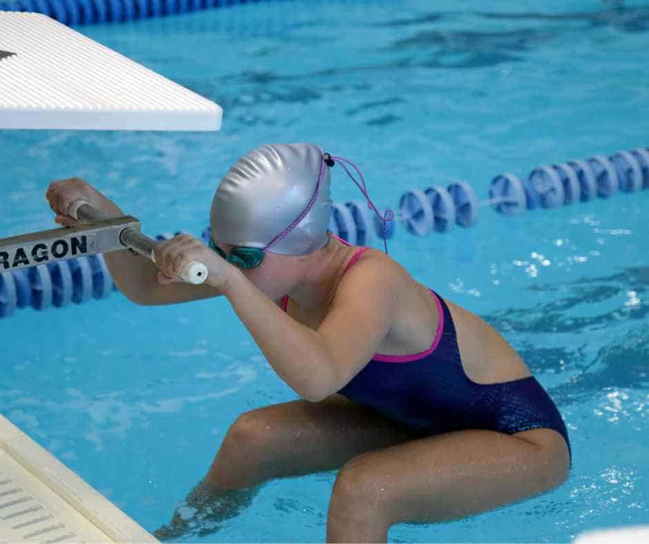 homeschool swimmer doing backstroke start