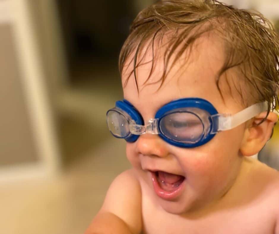 little swimmer with goggles